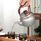 LIFKOME Traditional Stainless Steel Heavy Duty Tea Kettle With Sandwich Bottom and Specialty Cool Touch Handling Mirror Finish Stainless Steel Whistling Tea Kettle Stove Top