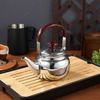 LIFKOME Traditional Stainless Steel Heavy Duty Tea Kettle With Sandwich Bottom and Specialty Cool Touch Handling Mirror Finish Stainless Steel Whistling Tea Kettle Stove Top